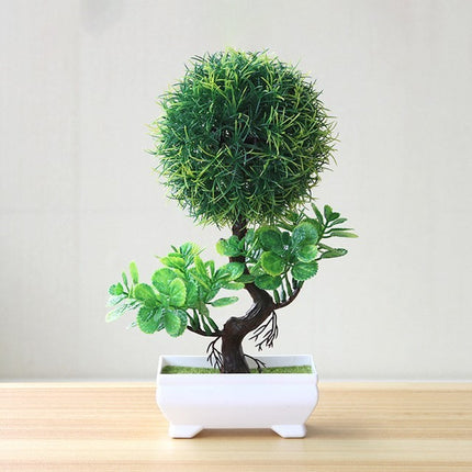 Plantas arbóreas pequeñas artificiales en macetas verdes