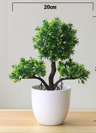 Plantas arbóreas pequeñas artificiales en macetas verdes