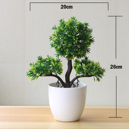 Plantas arbóreas pequeñas artificiales en macetas verdes