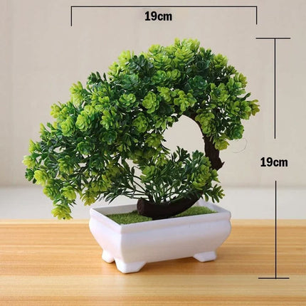 Plantas arbóreas pequeñas artificiales en macetas verdes