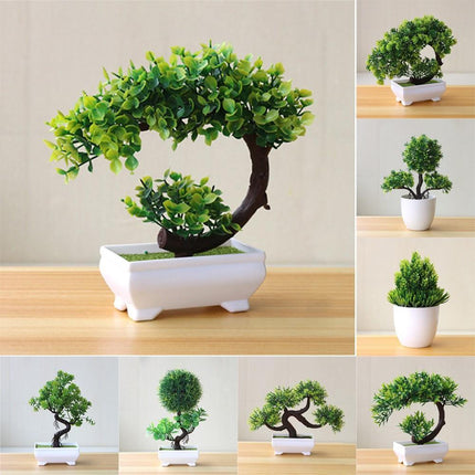 Plantas arbóreas pequeñas artificiales en macetas verdes